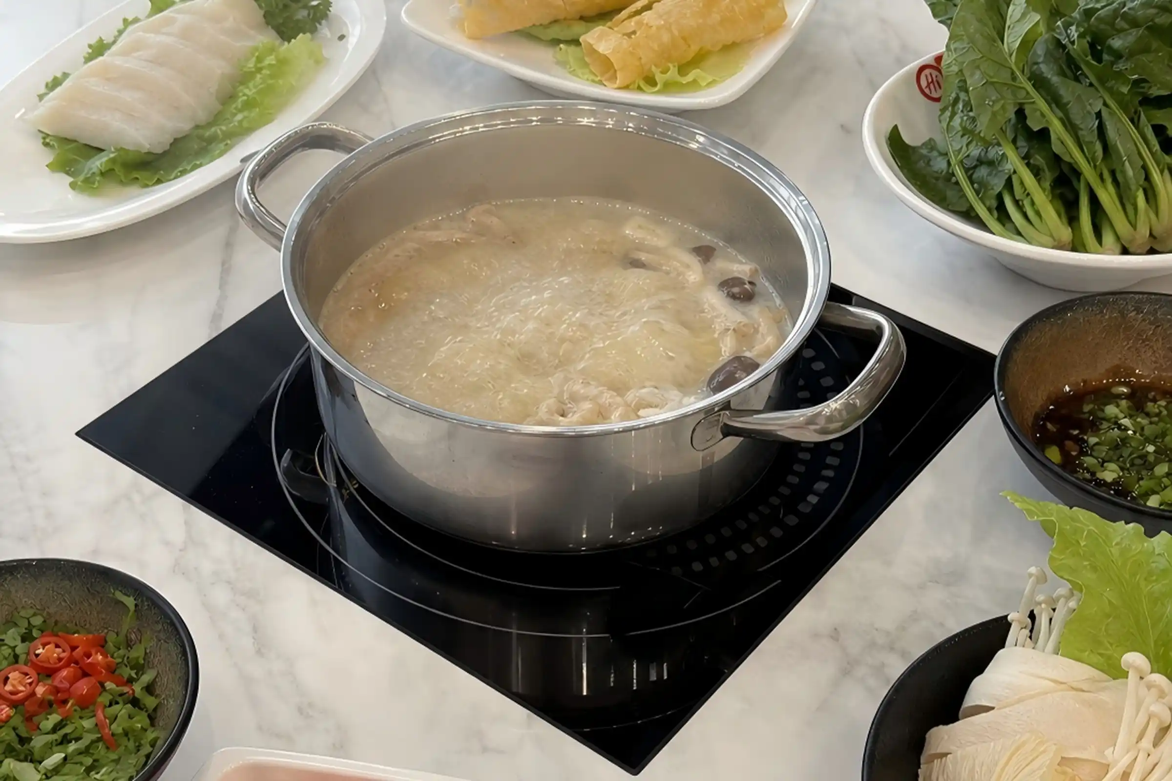 Hot pot restaurant build in cooker from ATRX brand